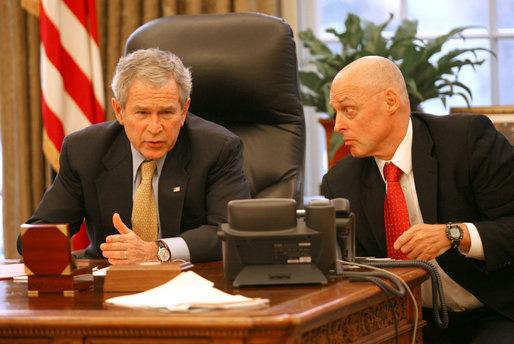 George Bush and Treasury Secretary Henry Paulson