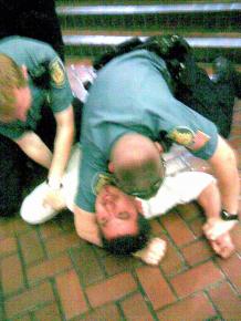 A cell phone picture of the police attack on Julio Hernandez