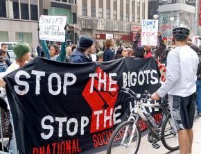 Protesters take a stand against Fox News outside the cable network's studios in New York City